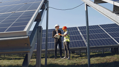 DYU Solar engineers reviewing a solar project on site